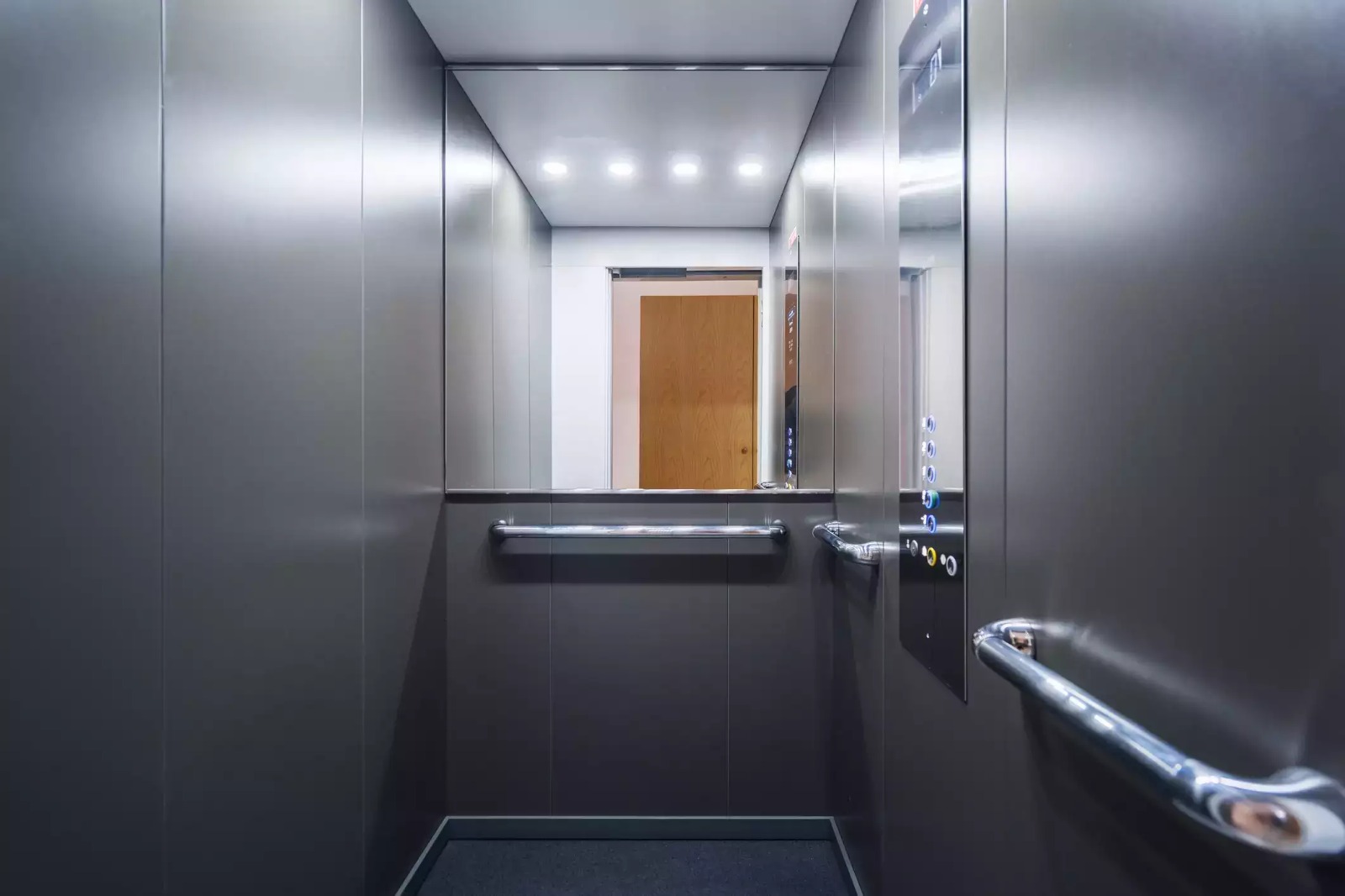 Why Are Mirrors Installed in Elevators?