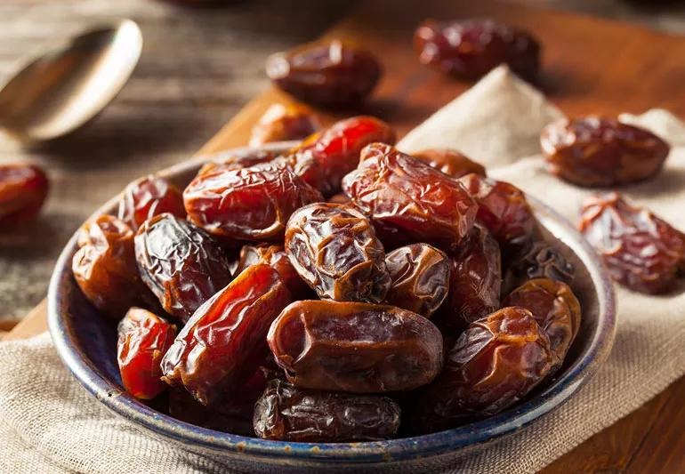Why do Muslims open their fasts with dates?