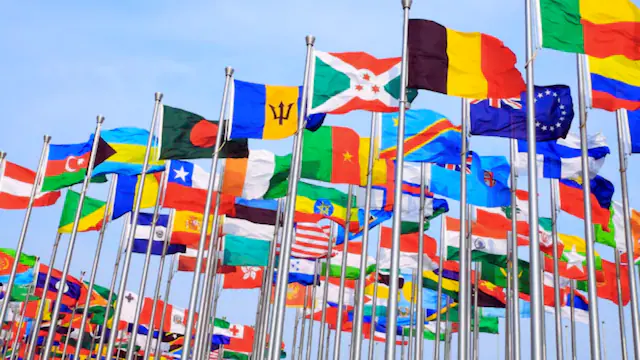 The Missing Hue: Why Purple Rarely Waves on Flags
