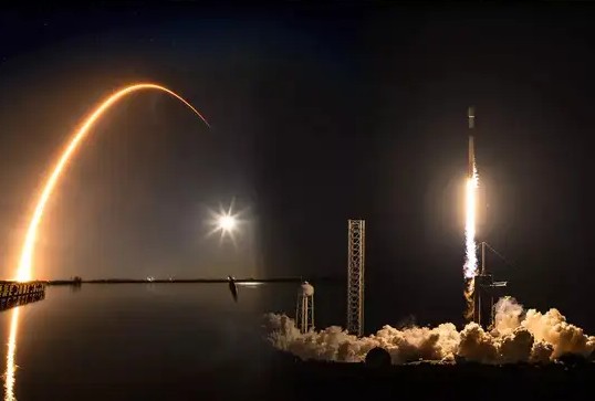 SpaceX just launched 21 satellites under a full moon—did you see it?