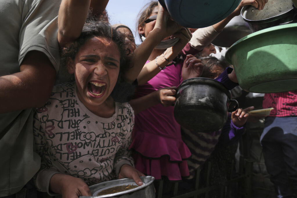 Israeli forces kill 40 Palestinians at US-backed aid sites in Gaza
