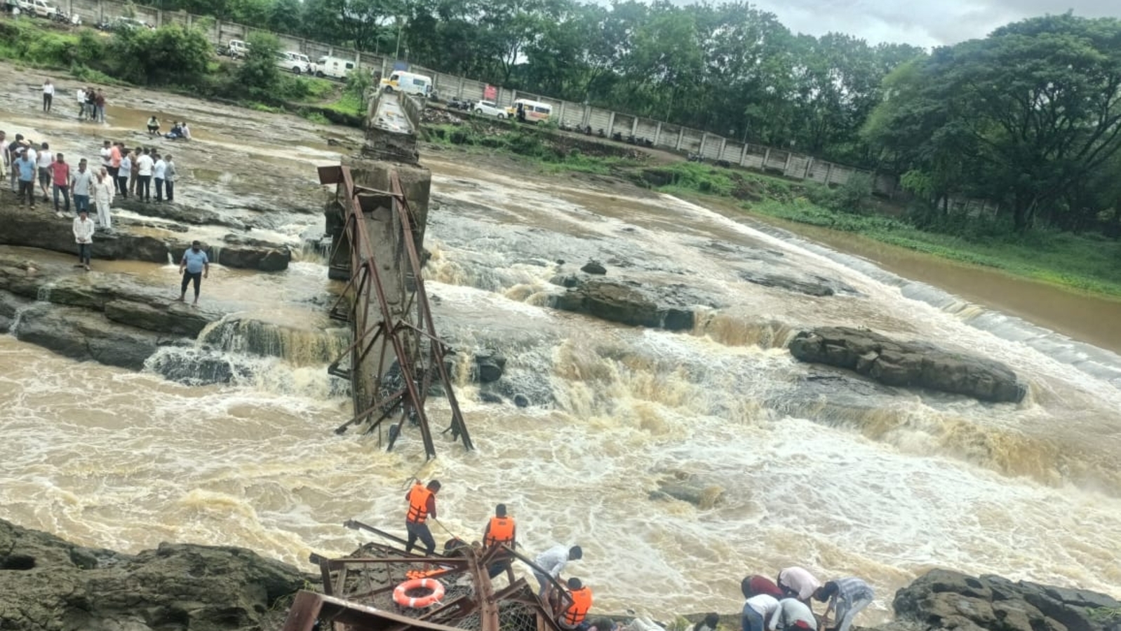 2 dead and 32 injured as tourists plunged into a raging river—bridge collapses near Pune